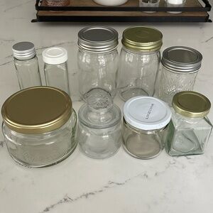 14 miscellaneous jars with lids